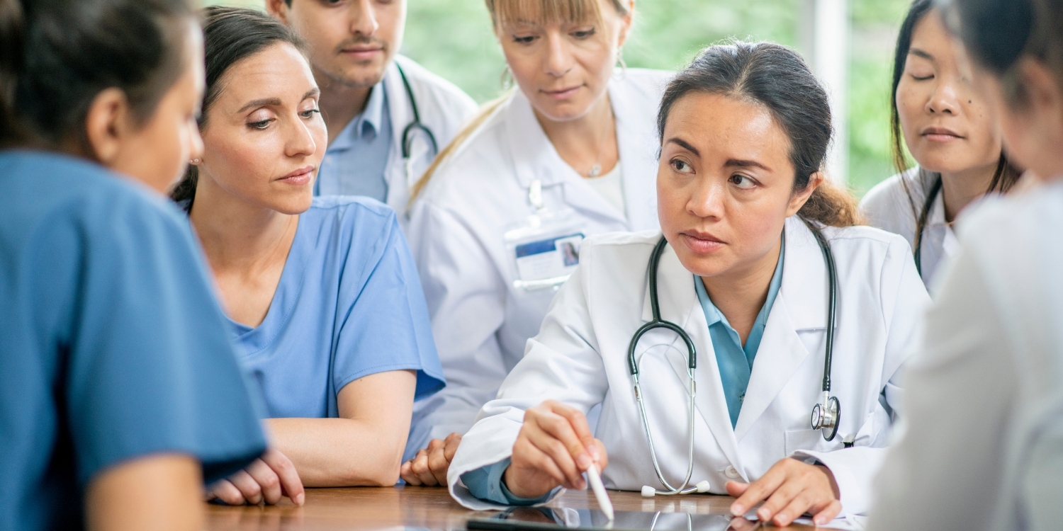 clinicians meeting together