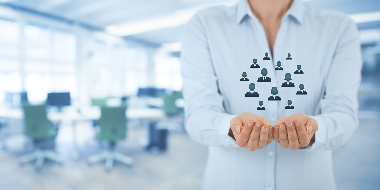women standing with her palms out with animated people hovering above 