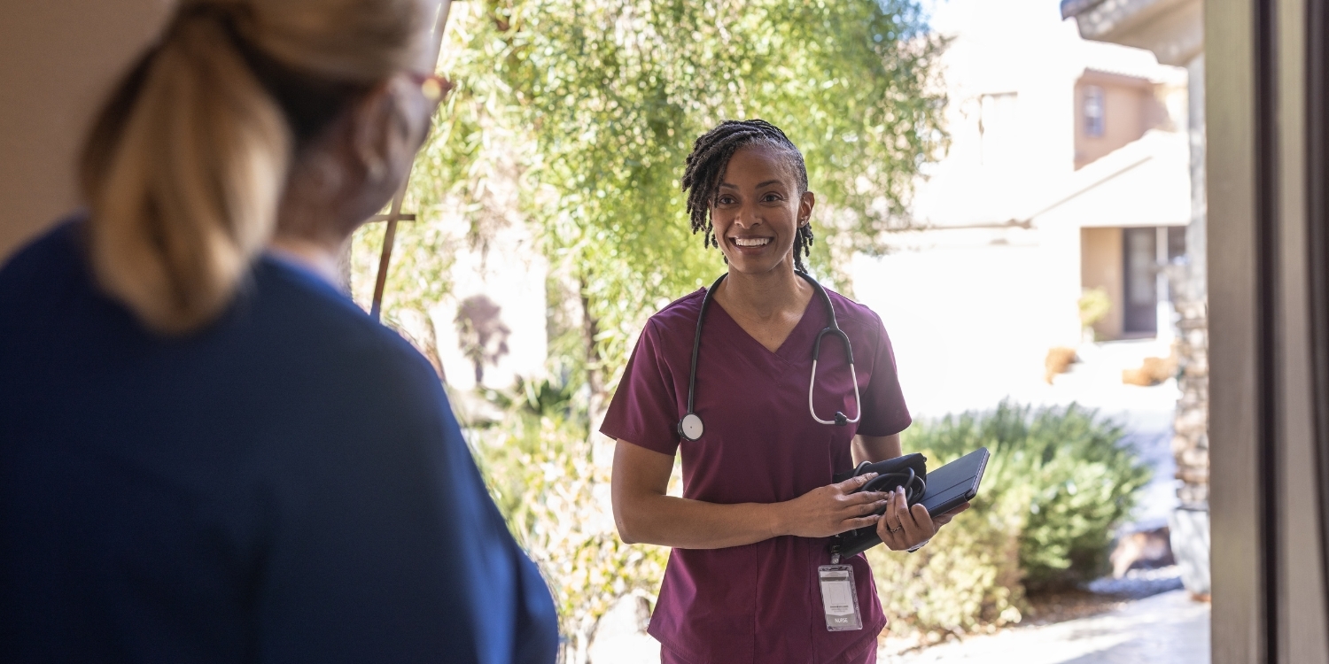 Caregiver arriving for visit at patient's home