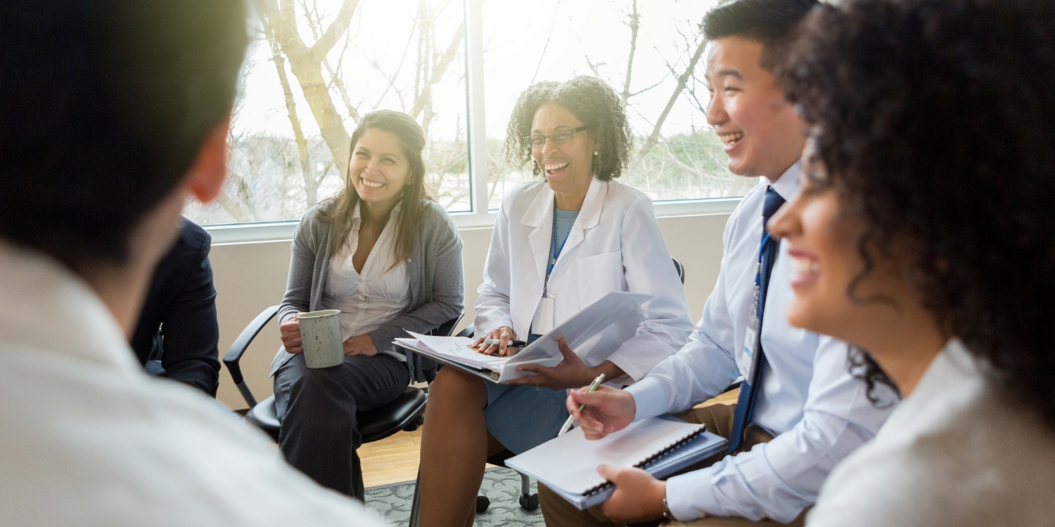 Clinical leaders smiling together