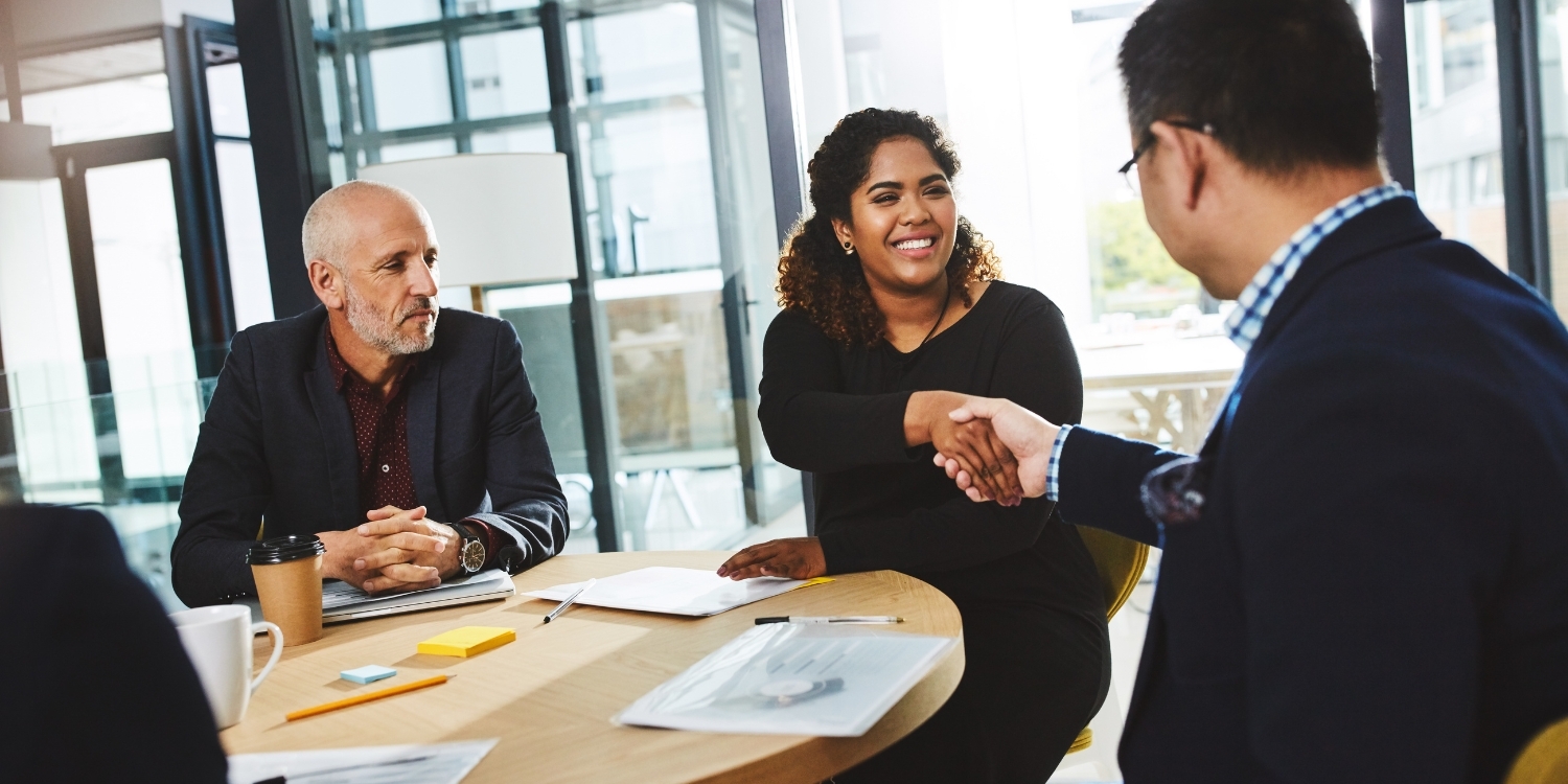 People shaking hands.
