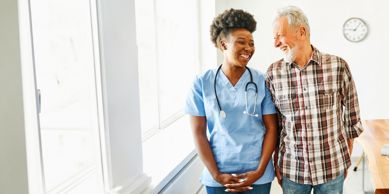 Clinician smiling with patient