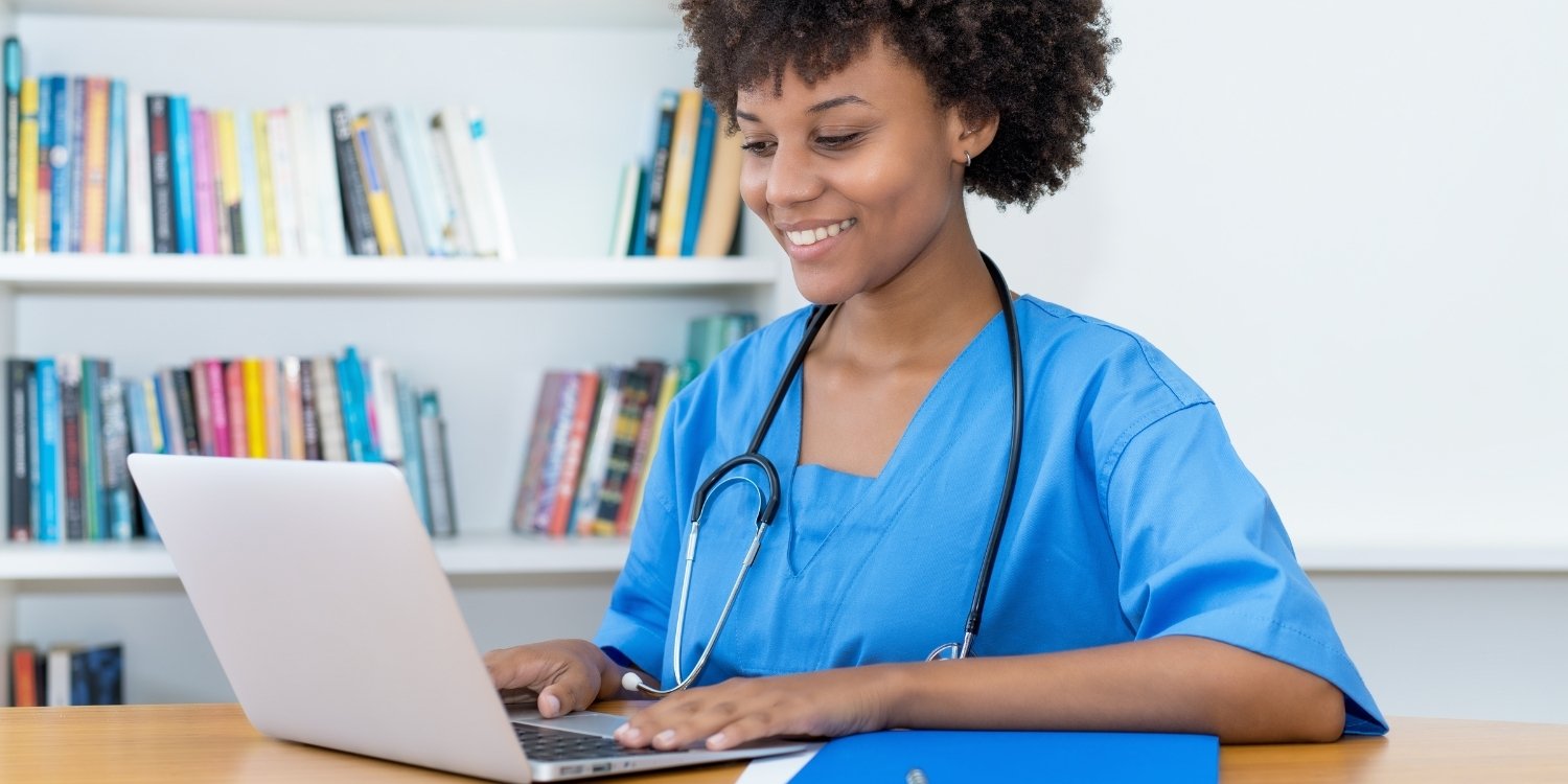 Clinician looking at a computer